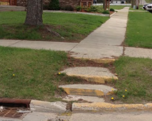Non-ADA compliant step that are in disrepair. 