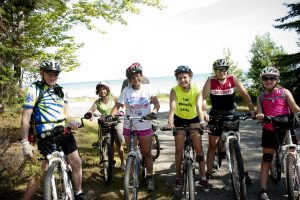 Michigander of youth riders with family