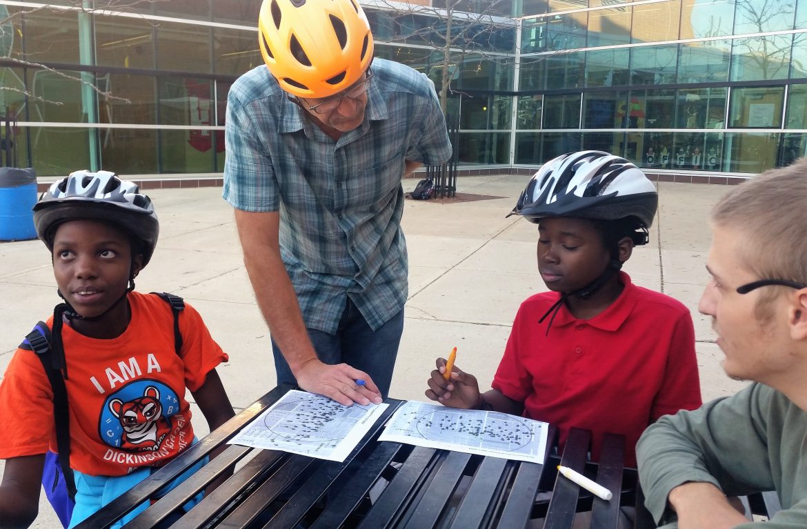 Students learning about bike routes selection