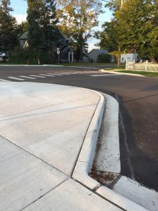New curb bump outs provided at intersection by East Jordan School