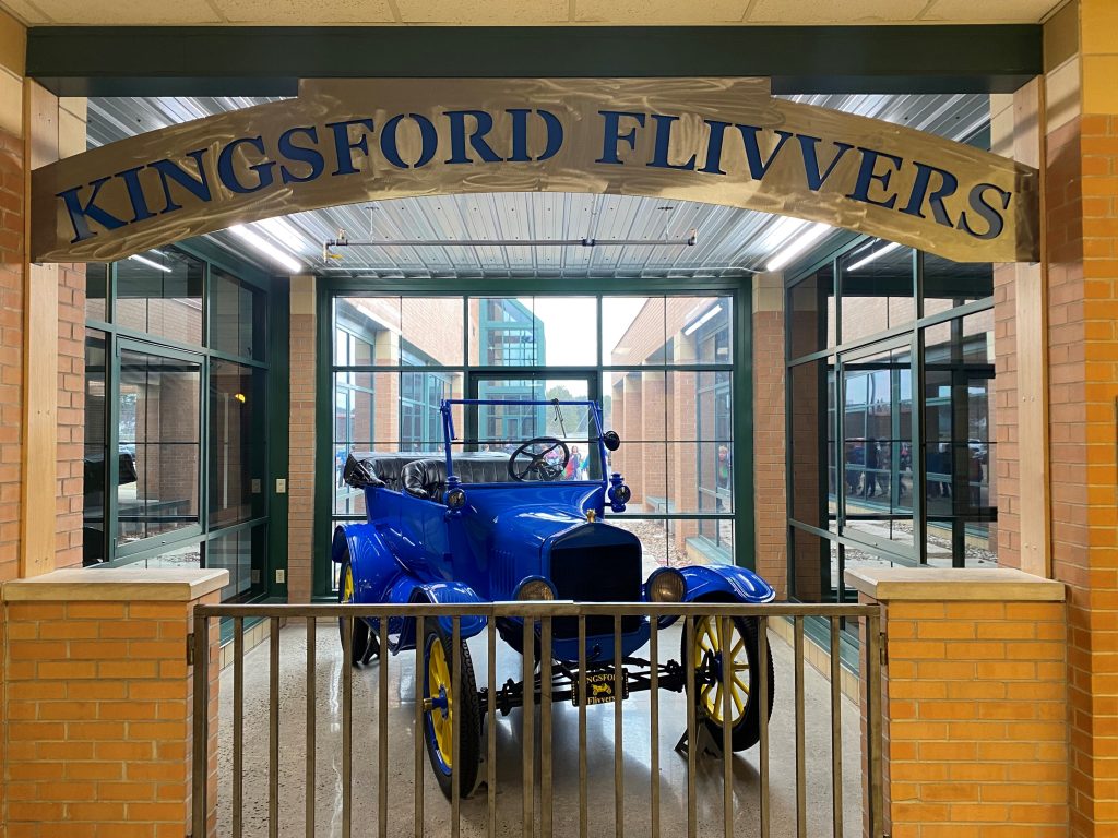Blue Ford Flivver car seen in Kingsford Flivvers building