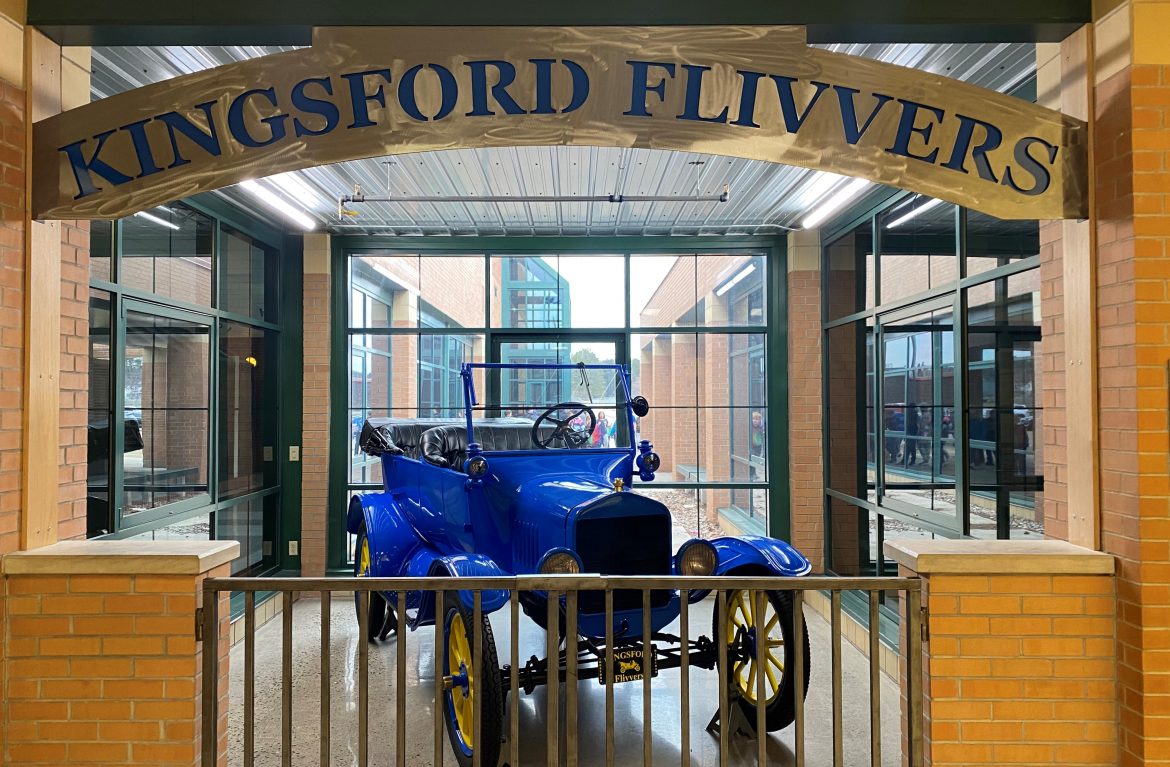 Blue Ford Flivver car seen in Kingsford Flivvers building