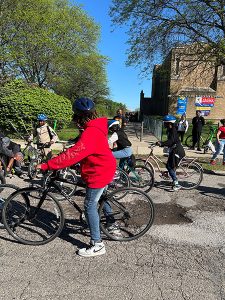 Students on bike as part of 2024 Bike and Roll to School Day event at JE Clark Prep Academy in Detroit.