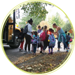 Children getting off the school bus